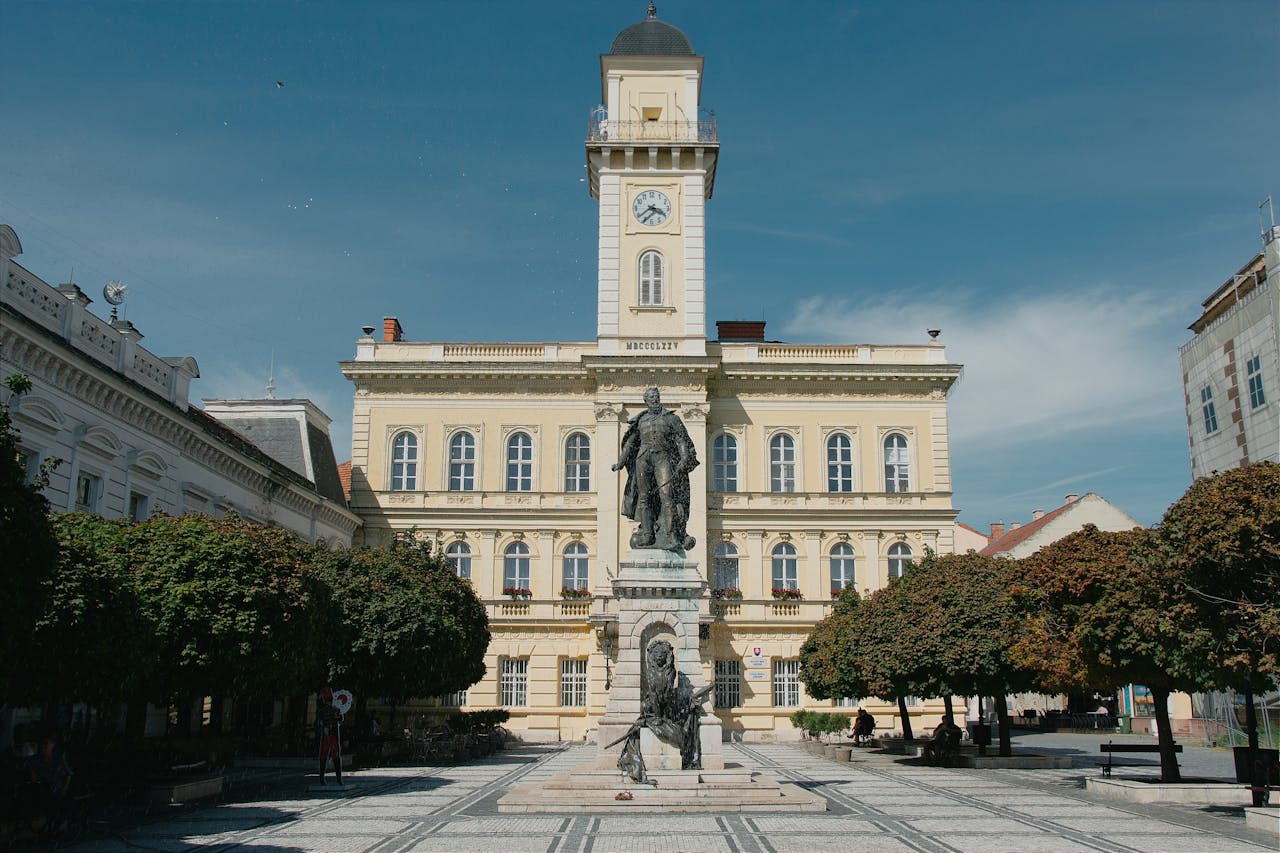 Stunning view of historic building and statue in Komárno, Slovakia, embodying classic architecture.
